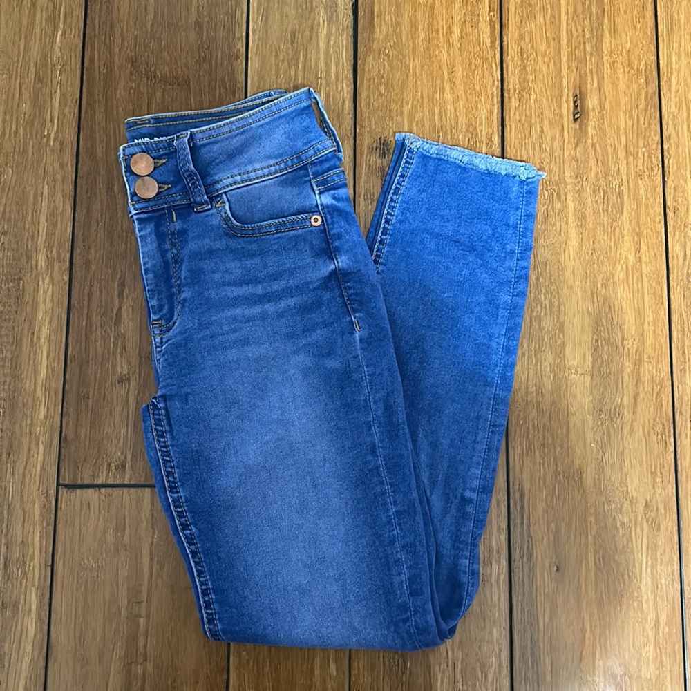 Blue mid rise skinny jeans